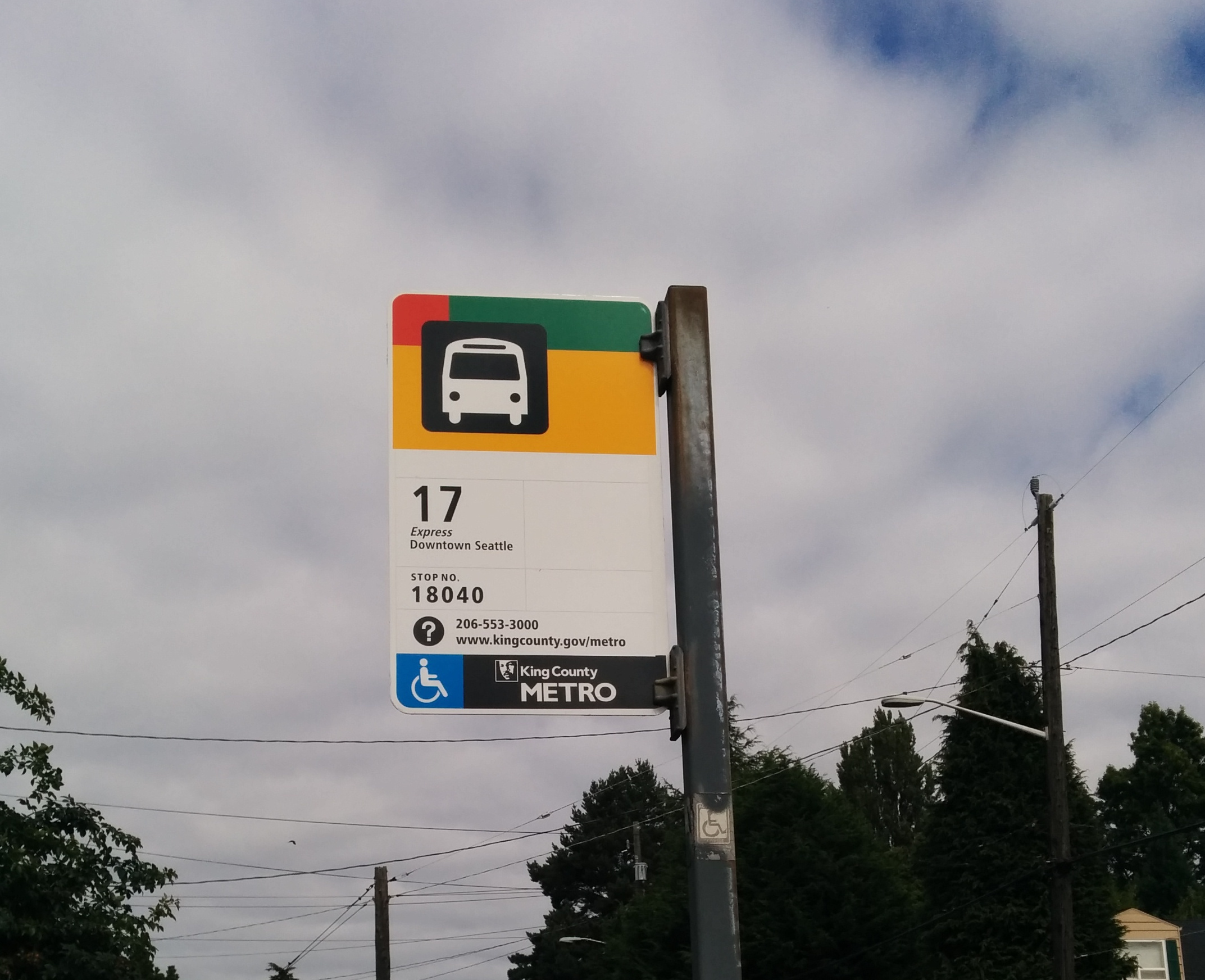 Metro 61 already removed from this Ballard flag post.