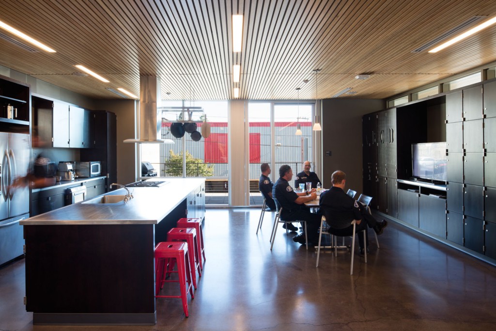 The kitchen and dining space. Photo by Lara Swimmer, courtesy of Schacht Aslani Architects. 
