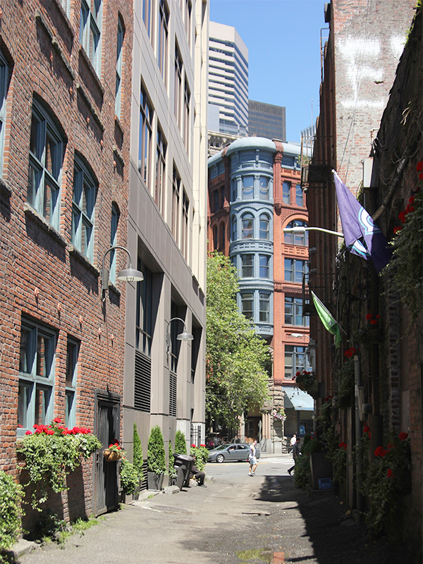 An alley in Pioneer Square, Seattle, has charming historic buildings.