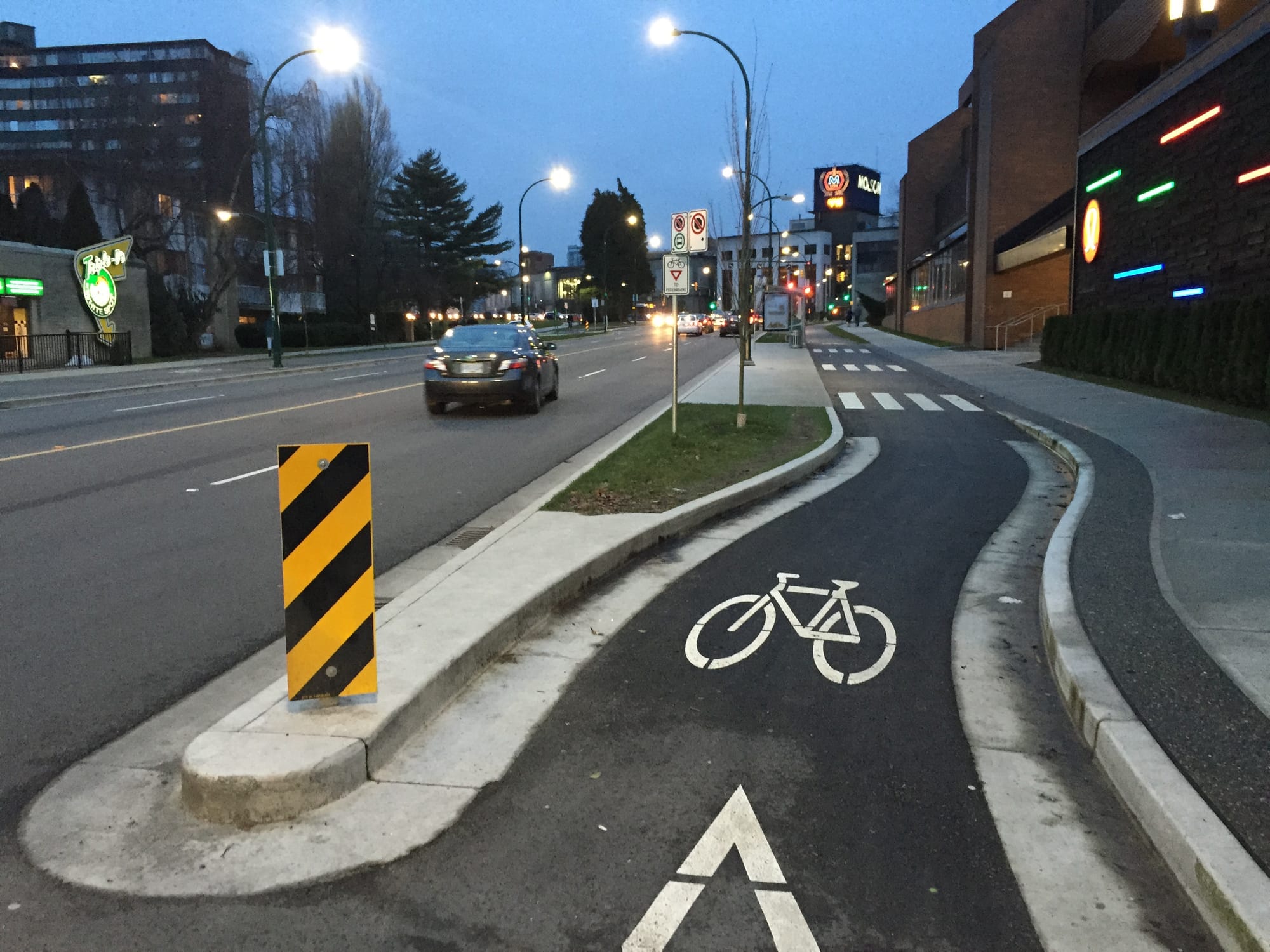 Bus island with shared space for pedestrians and bikes in Vancouver, BC.