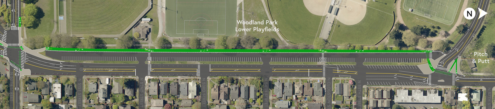 Two-way protected bike lane through the Woodland Park Lower Playfields Parking Lot.