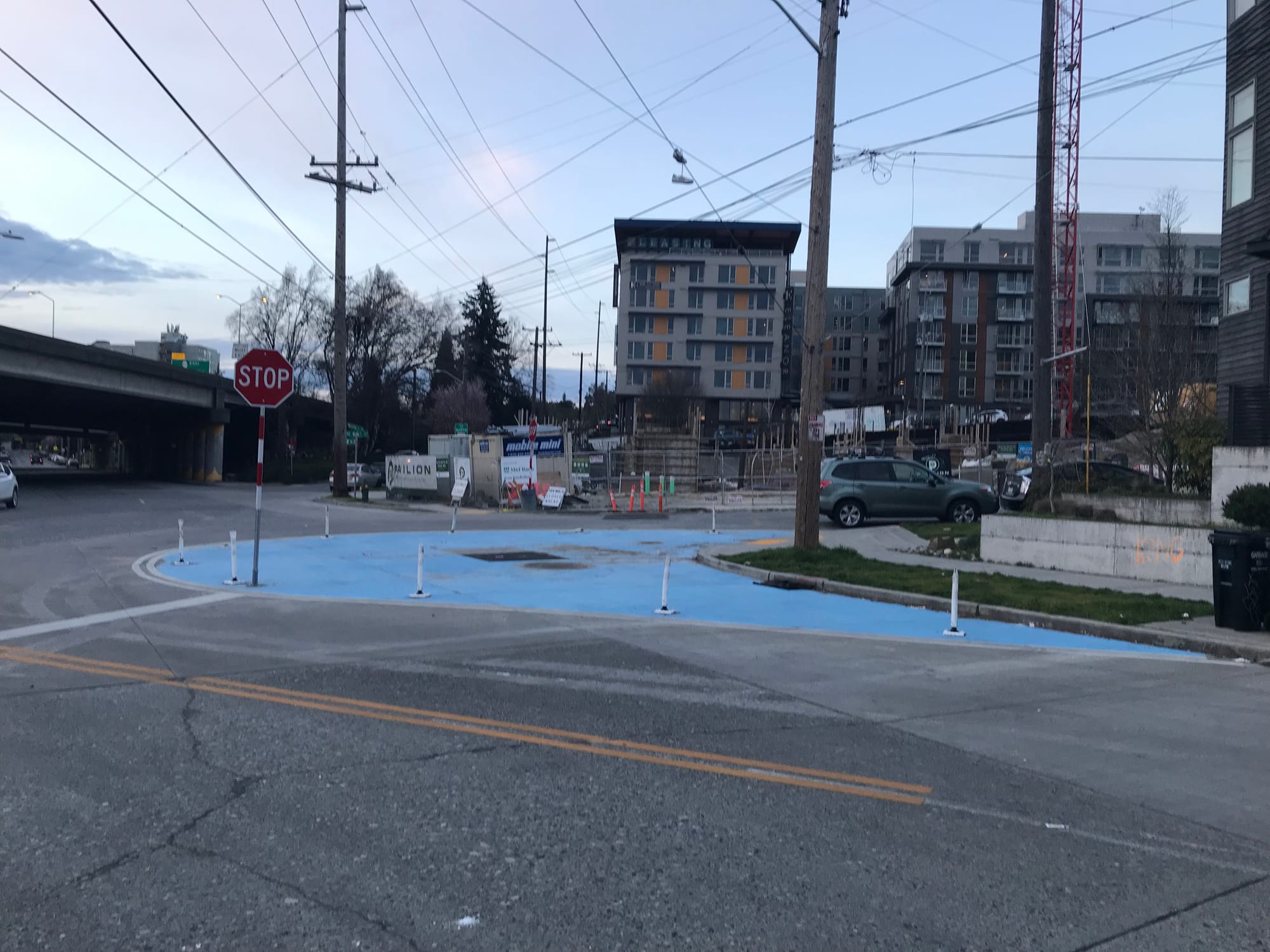 Weedin Pl NE painted curb bulb at NE 66th St.