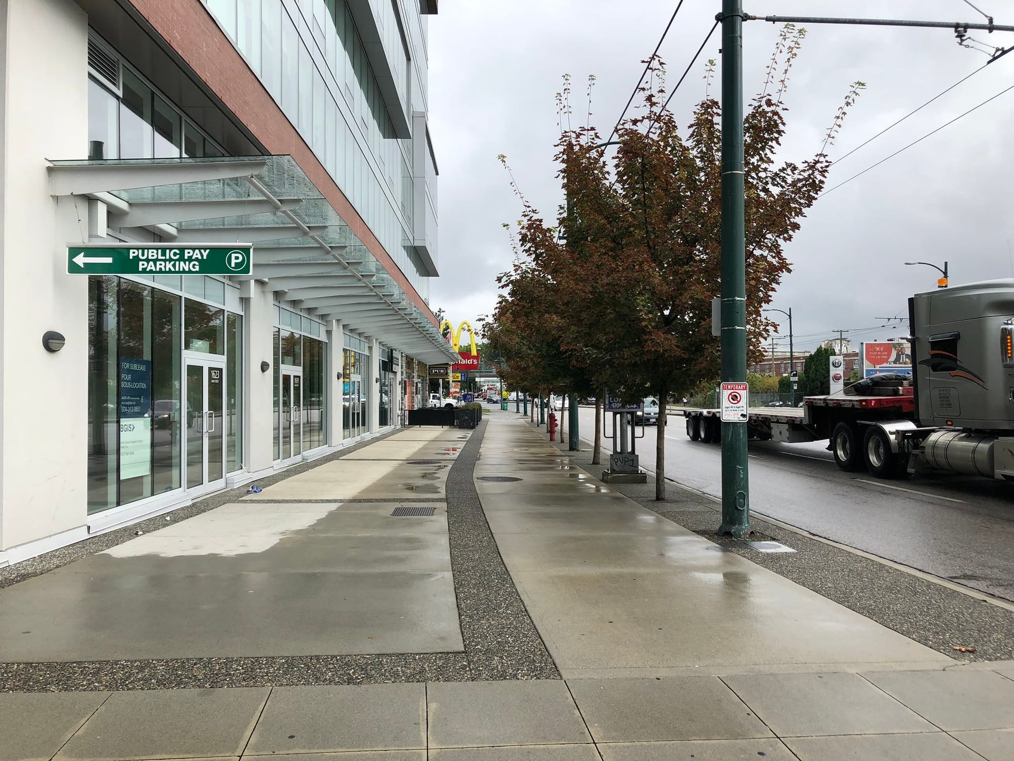 BC Highway 1A features a sidewalk so wide you can provide café seating. (Image by the author)