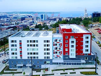Hoa Mai Gardens, a dense SHA housing development in Yesler Terrace, which also contains space for nonprofits like  youth writing organization the Bureau of Fearless Ideas. (Credit: SHA)