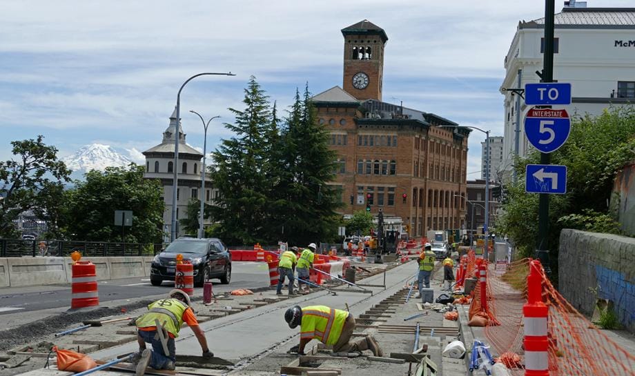 Trackbed installation for the streetcar on S Stadium Way. (Sound Transit)