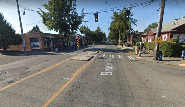 A photo show an intersection with a green light on Beacon Avenue. 