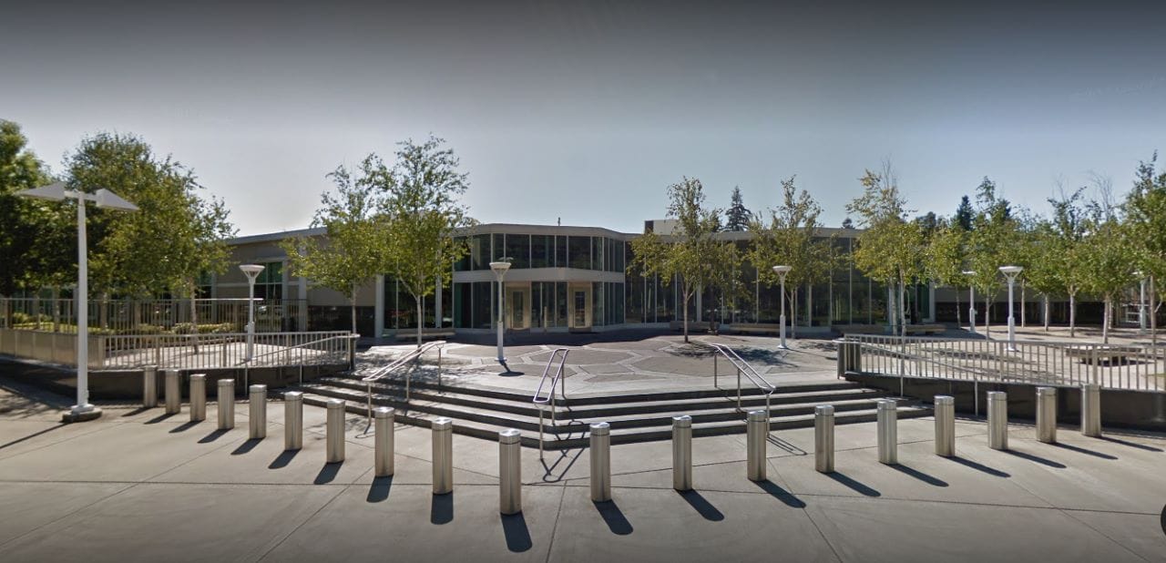 A barriers of metal bollards guards the stairs to the jail.