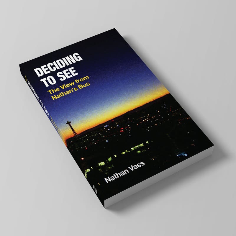 A picture of the book shows the cover art with a stylized Space Needle photo at sunset.
