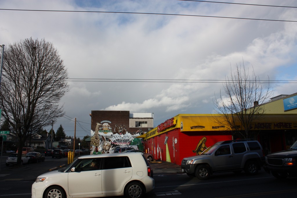 Archie McPhee's apparently is a joke shop. It includes a side parking lot squandering a prime frontage at a busy intersection.