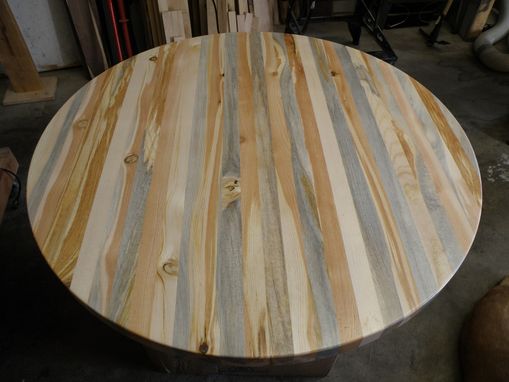 Some woodworkers and furniture makers are specializing in beetle kill pine and showing its aesthetic appeal. CLT could capitalize on the rustic appeal and put to good use the glut of beetle kill pine on a larger scale. (Custom Made)
