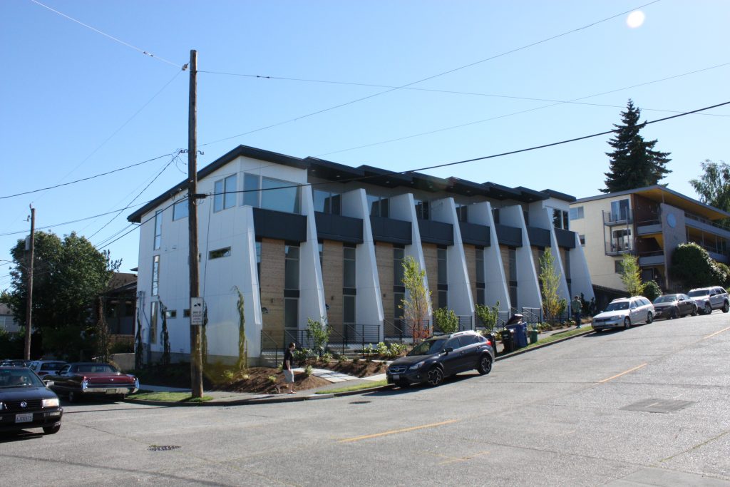 A rowhouse of six units is a recent addition at 46th and Whitman Avenue.