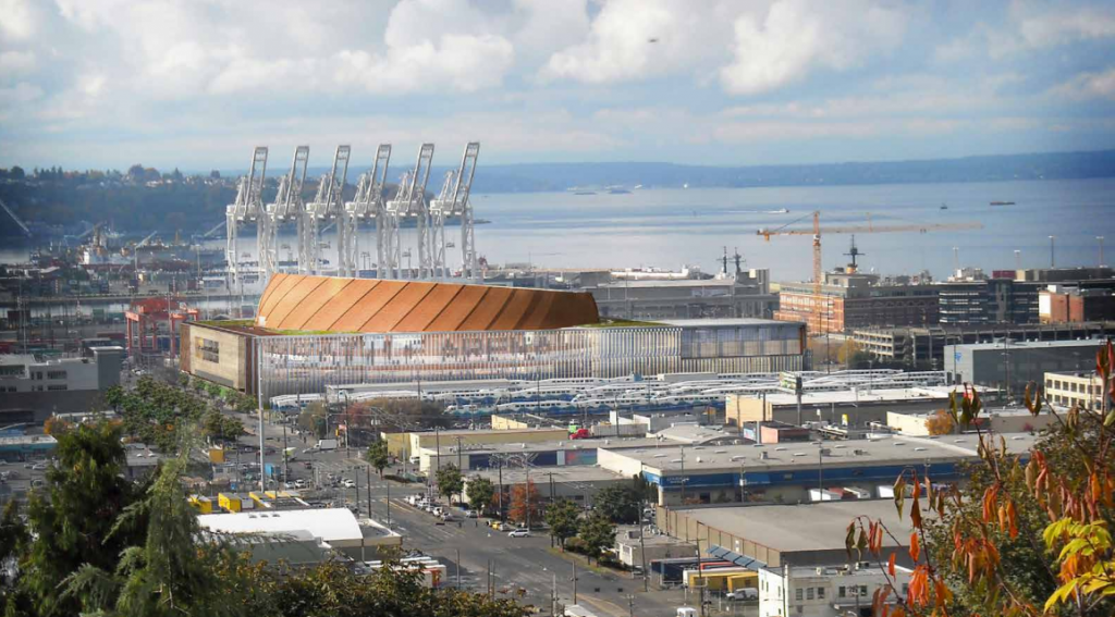 This rendering lends perspective to the close proximity of the proposed arena to Port of Seattle operations.