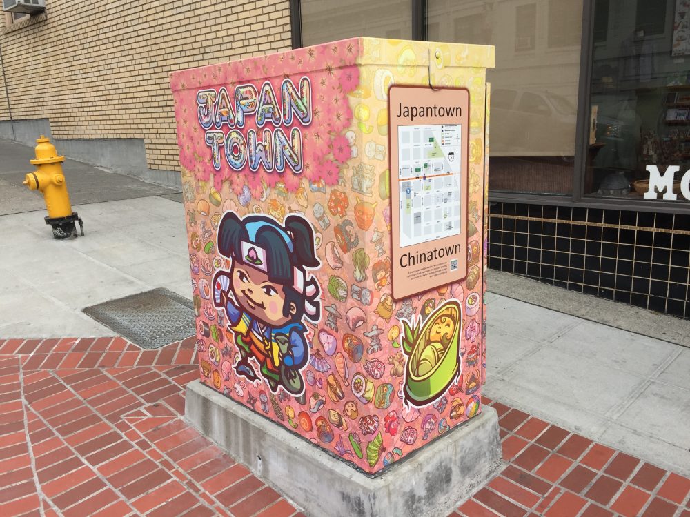 A wrapped utility box on Jackson Street.