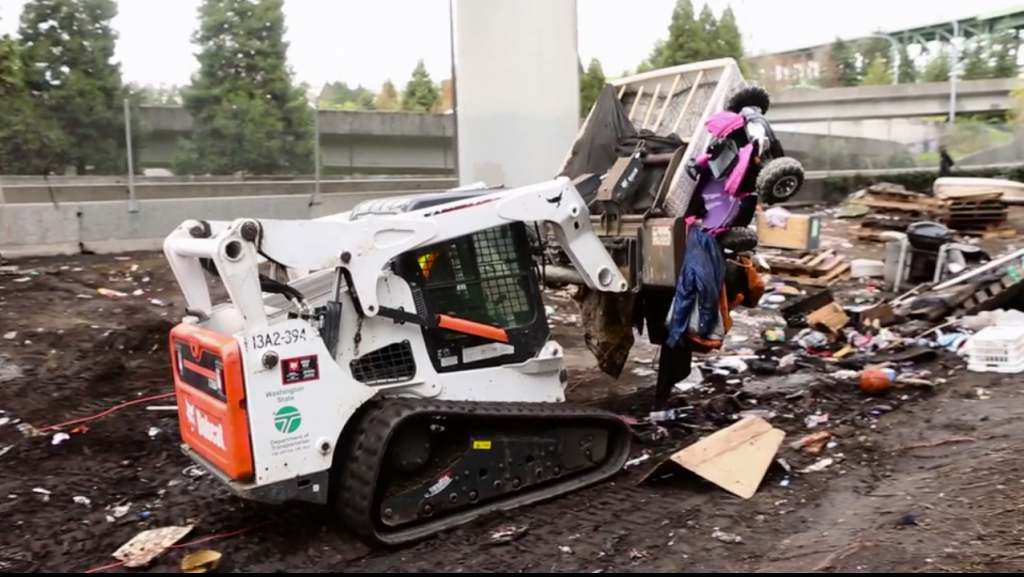 WSDOT used bulldozers to clear this encampment in the International District. (Seattle Times)