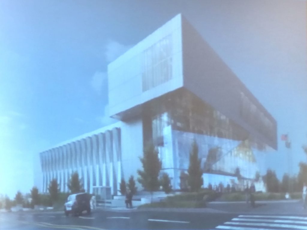 The rendering presented at the meeting reflects the trimmed parking ramp.