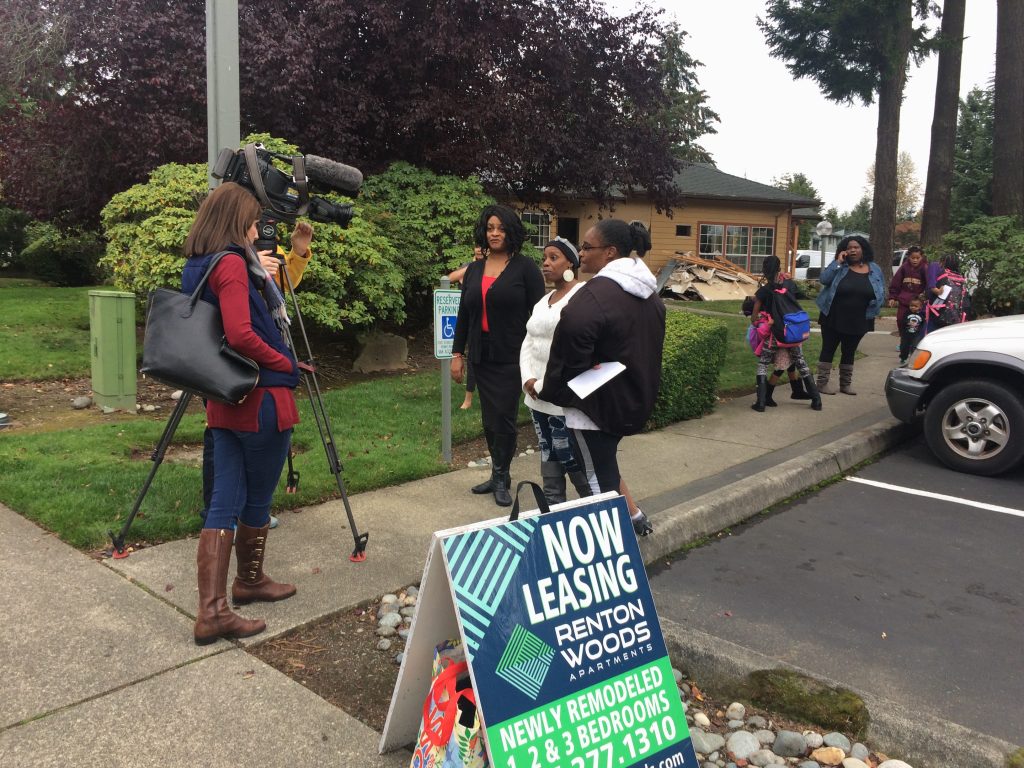 Renton families speak with media about displacement.
