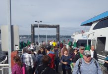 Kirkland-to-UW and Kenmore-to-UW Rise to the Top in Passenger-Only Ferry Study Passengers on Colman Dock with a ferry docked.