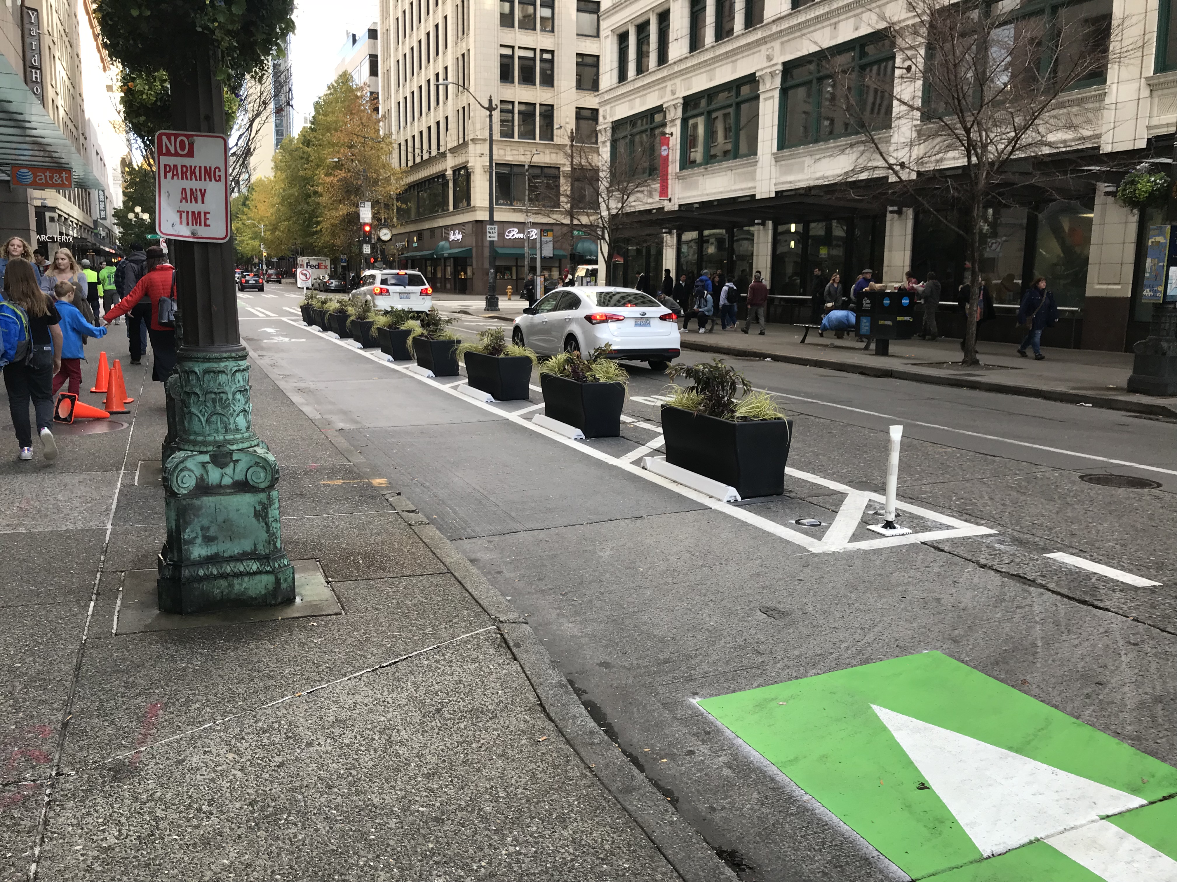 Planter boxes providing separation on Pike Street.