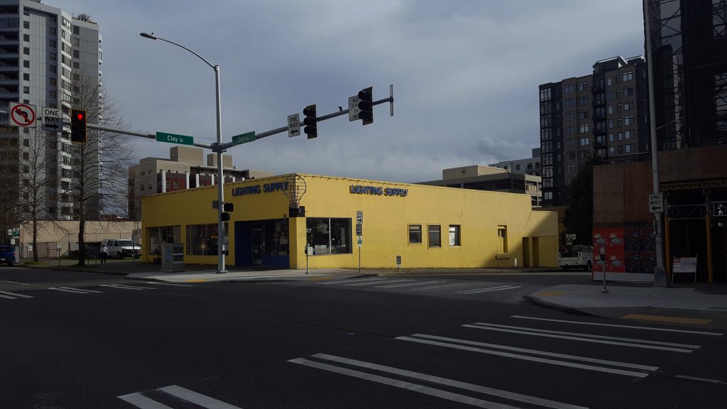 A one-story retail building in Belltown that currently has no redevelopment plans. (Photo by author)