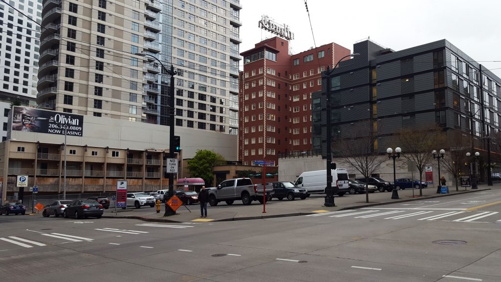 One of the last large parking lots in Downtown at 8th and Pine will soon be redeveloped with a 55-story apartment and hotel tower. (Photo by author)