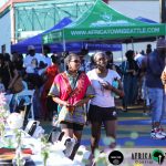 Dinner Scene with Africatown Sign