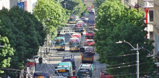 King County Metro buses on Third Avenue during rush hour. (Bruce Englehardt)