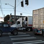 here, three vehicles blocked the crosswalk the entire time it said walk