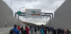 The entrance portal to the new SR-99 tunnel was filled with pedestrians during a special event before the grand opening.