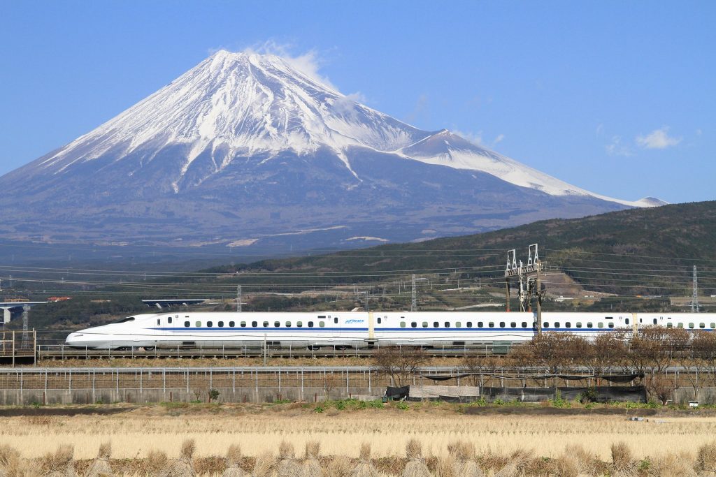 The Tōkaidō Shinkansen high-speed line in Japan, with Mount Fuji in the background. The Tokaido Shinkansen was the world's first high-speed rail line. (Wikipedia / tansaisuketti)