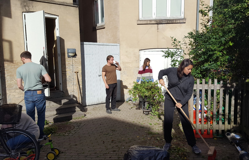 Work party cleaning up common spaces at a private cooperative. (Roxanne Glick)