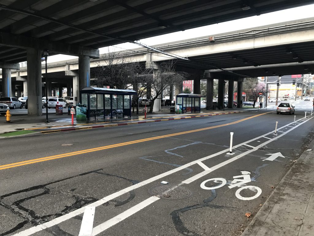 New bike lane and in-lane bus stop curb extension. 