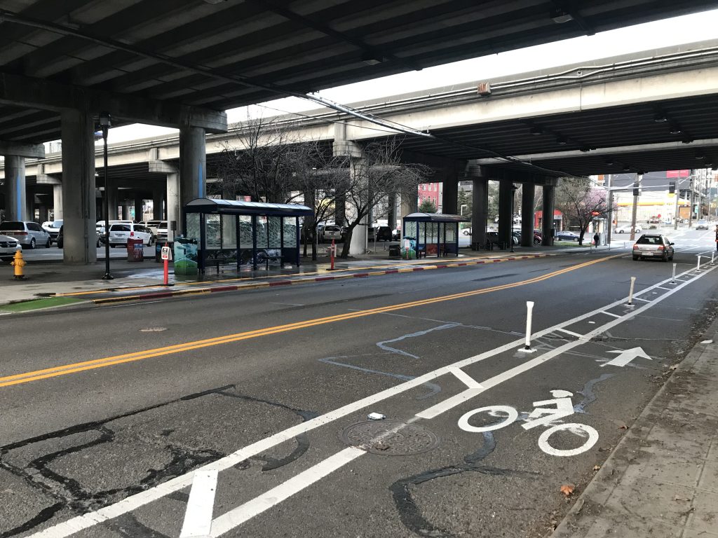 New bike lane and in-lane bus stop curb extension.