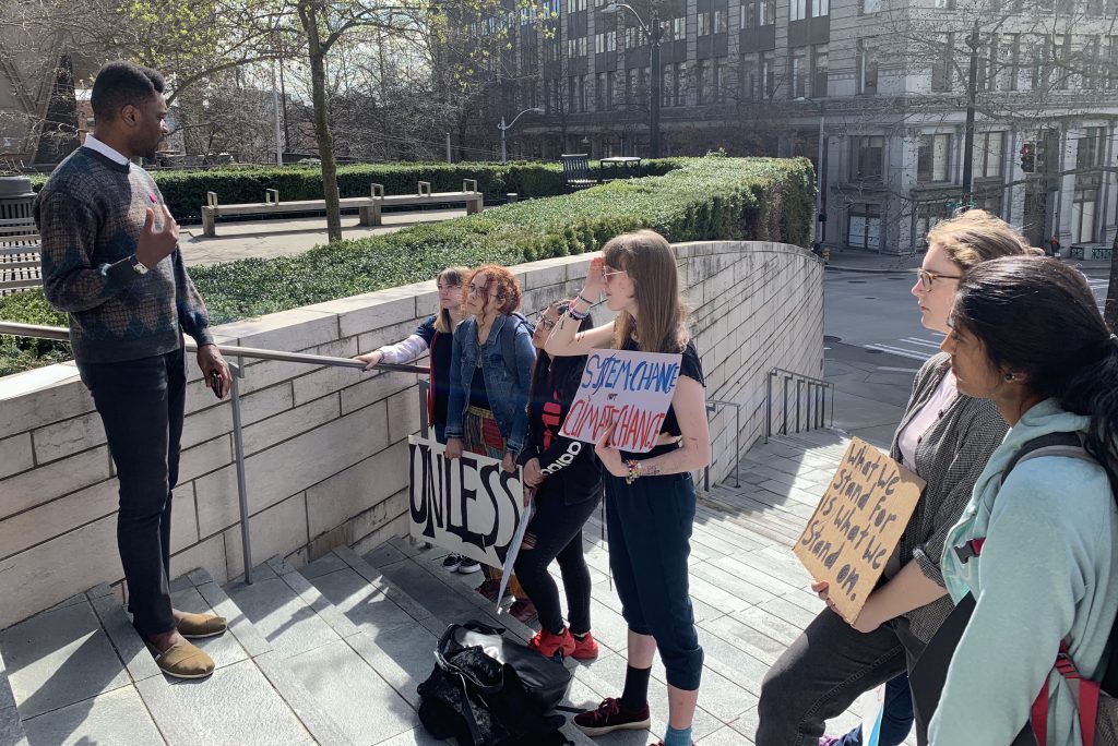 District 4 City Council candidate Shaun Scott spoke to the youth climate activists at the first Fridays for the Future rally. (Photo by Natalie Bicknell).