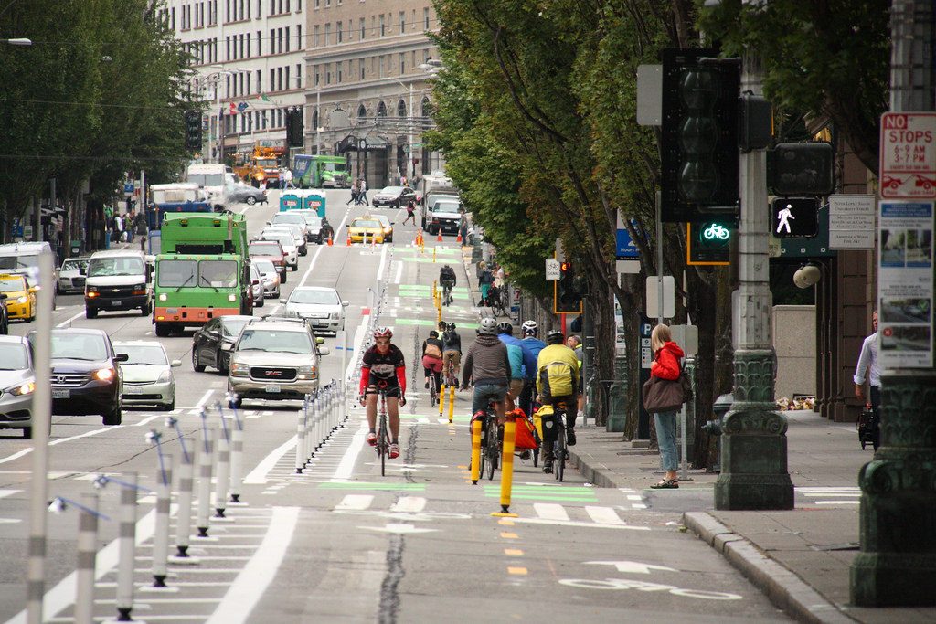 The Second Avenue protected bike lane was extended to Denny Way in 2018. Congestion pricing could fund more walking and biking infrastructure while making it more pleasant to use by lowering car traffic.(SDOT)