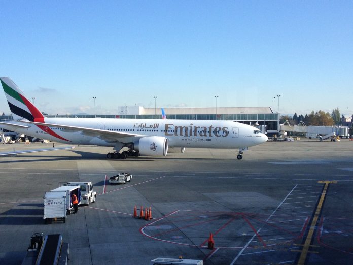 Emirates plane taxiing at Sea-Tac International Airport.