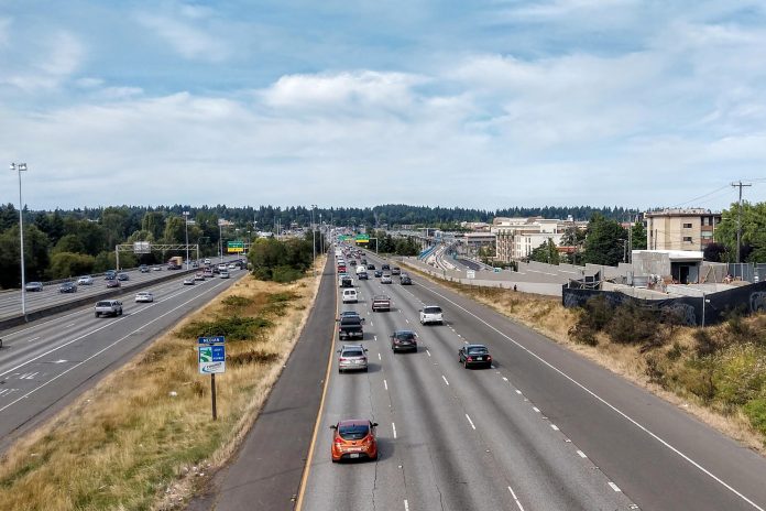 I-5 through Northgate section of Seattle. Northgate Station rises on the right.(Photo by Doug Trumm)
