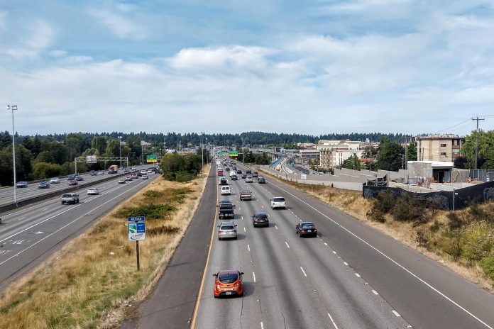 I-5 through Northgate section of Seattle. Northgate Station rises on the right.(Photo by Doug Trumm)