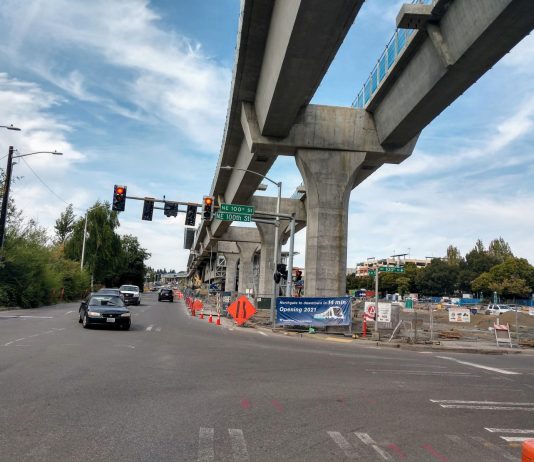 Sound Transit Has a Plan to Deliver 130th Street Station in 2025, but Will the Board Fund It? Elevated light rail with pylons next to a street in Northgate.