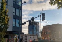 We Can Rezone The Ave While Preserving Its Historic Character The M Tower, the first highrise out of the gates after the U District was rezoned in 2017, rises in the background of this shot of The Ave at NE 50th St. (Photo by Doug Trumm)