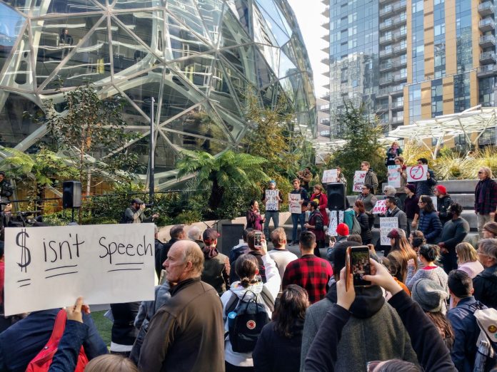 IMG_20191024_122425070_HDR About a 100 people rallied against Amazon for trying to buy the Seattle City Council elections. (Photo by Doug Trumm)