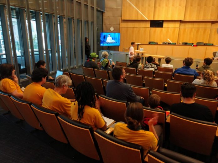 Seattle City Council Chambers with testifiers