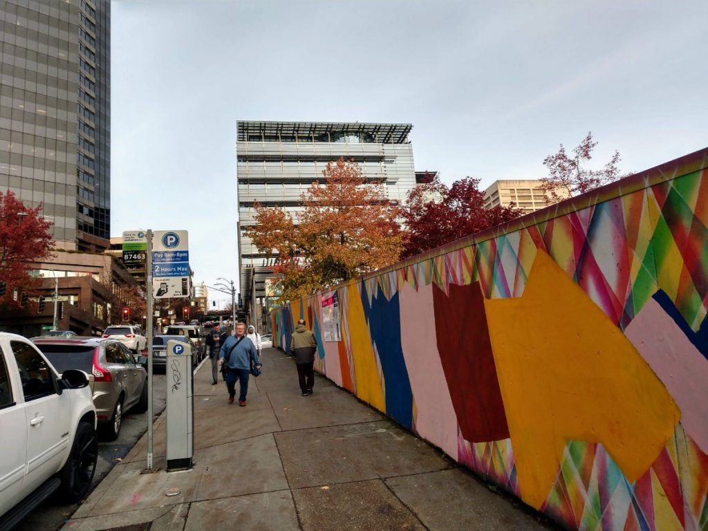 Seattle City Hall and the colorful fence for Civic Square pit. (Photo by author)