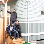 Photo outside house with MyKabin and owner