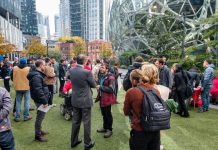 Most Progressive Seattle City Council Ever Tainted by Failure to Elect Shaun Scott An Amazon contract employee who opposed Amazon's copious campaign spending talks to a reporter. before an October 24th rally at the Amazon Spheres. (Photo by author)