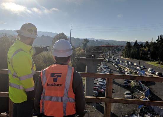 From November 2018: "Looking south from the platform at the South Bellevue Station. Note the columns where the train guideway will rise above traffic on Bellevue Way Southeast." (Sound Transit)