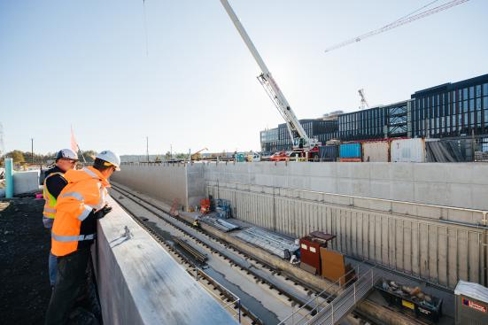 REI's new headquarters is the backdrop for this shot of Spring District Station. (Sound Transit)