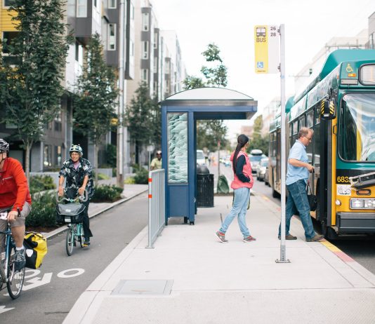 Safety and Equity Outcomes Must Guide Seattle Transportation Plan A floating bus stop and protected bike lane on Dexter Avenue. (Photo by Adam Coppola)