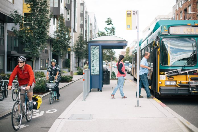 A floating bus stop and protected bike lane on Dexter Avenue. (Photo by Adam Coppola)