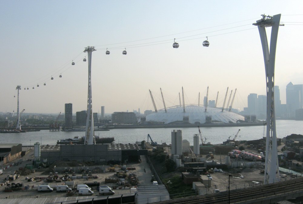 The towers of London's Emirates Air Line gondola lift cable car, from the north bank of the River Thames. (Credit: Nick Cooper via Wikimedia Commons)