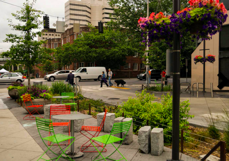 Bell Street Park, a shared street with park features such as enhanced seating, greenery, and a design that supports traffic calming, will be extended from 1st Avenue to Elliot Avenue. Designing the Bell Street Park extension at the same time as Battery Portal Park offers the opportunity to create a "cohesive design that honors the Belltown neighborhood," Asis said. (Credit: TIA International Photography)